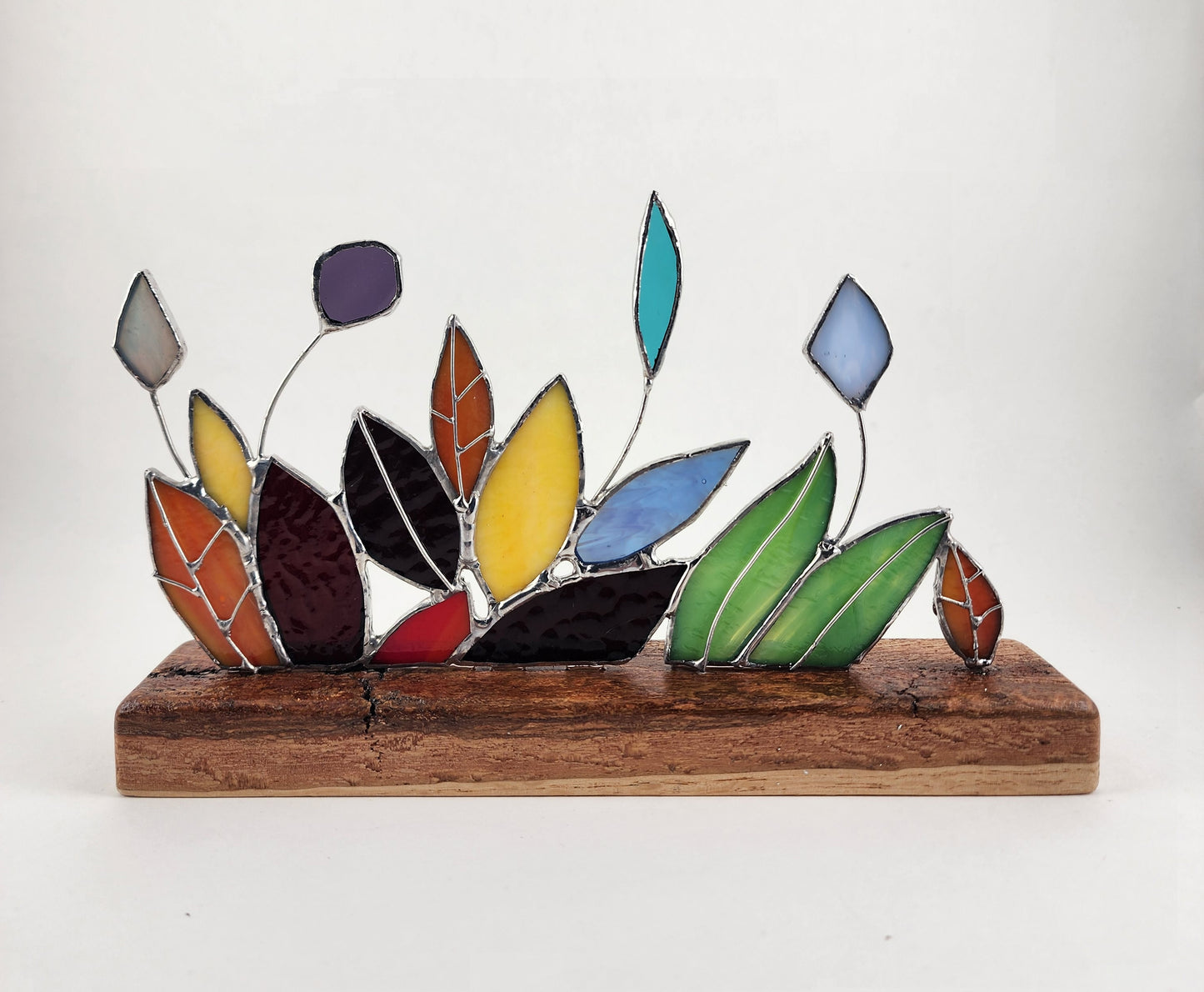 Abstract Colored Leaves on Wooden Base Stained Glass