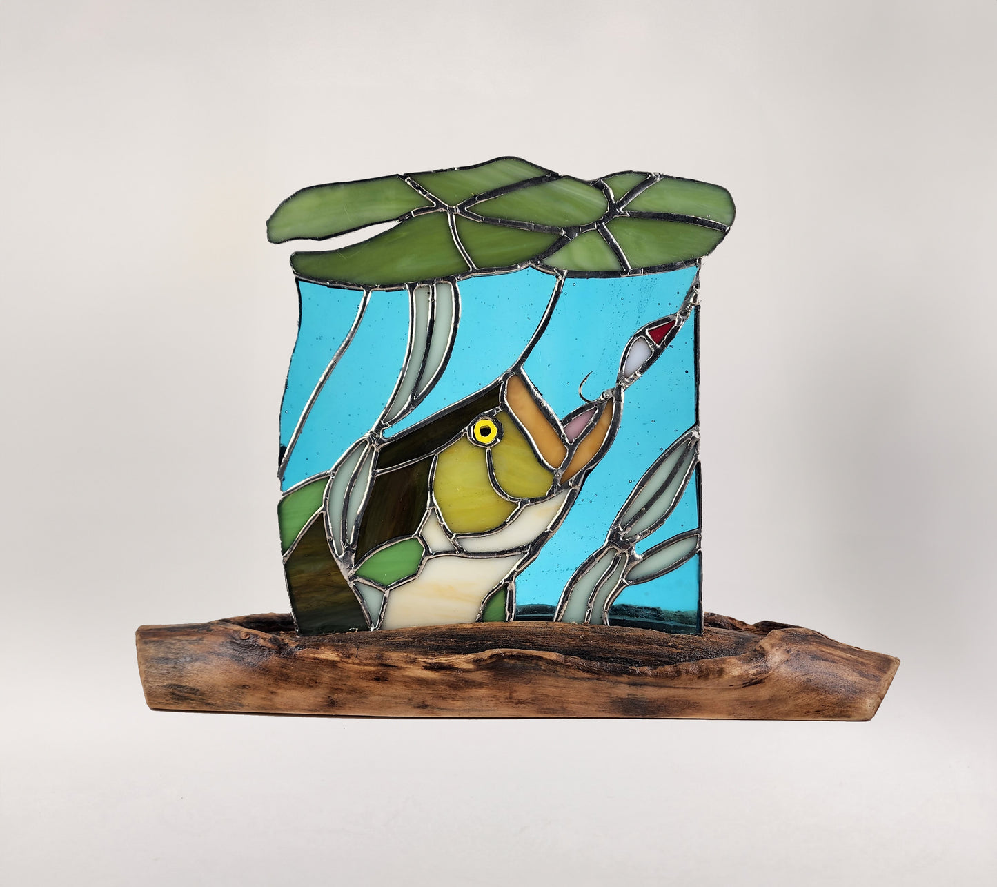 Hooked Bass on Log Stained Glass